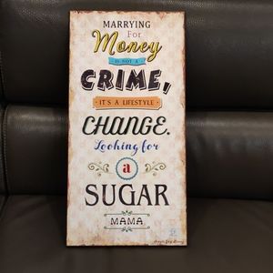Marrying for money is not a crime, wood sign